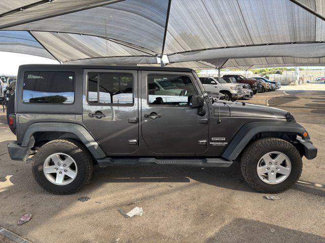 used 2014 Jeep Wrangler Unlimited car, priced at $21,999