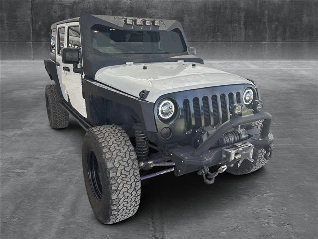 used 2015 Jeep Wrangler Unlimited car, priced at $22,499