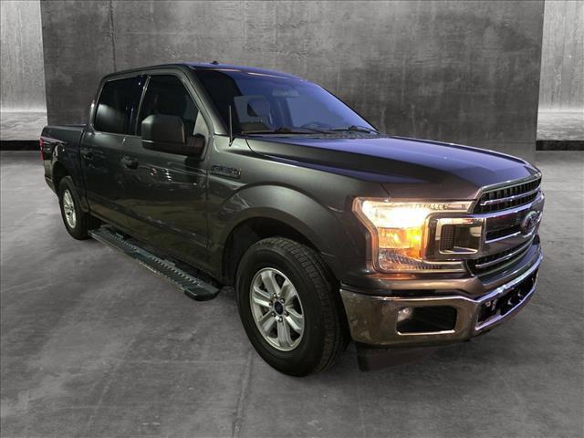 used 2018 Ford F-150 car, priced at $23,403