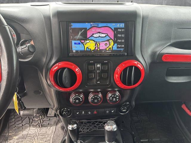 used 2016 Jeep Wrangler Unlimited car, priced at $19,179