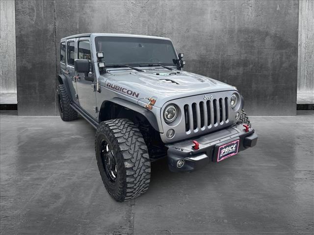 used 2016 Jeep Wrangler Unlimited car, priced at $19,179