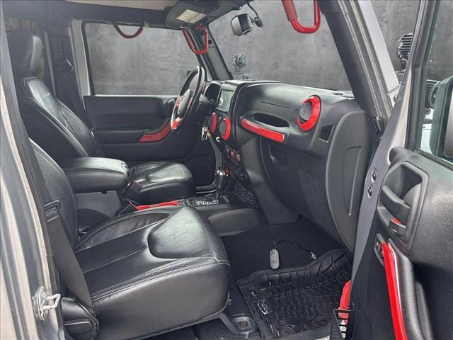 used 2016 Jeep Wrangler Unlimited car, priced at $19,179