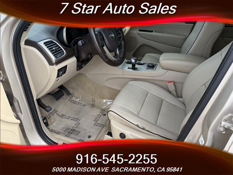used 2014 Jeep Grand Cherokee car, priced at $12,499