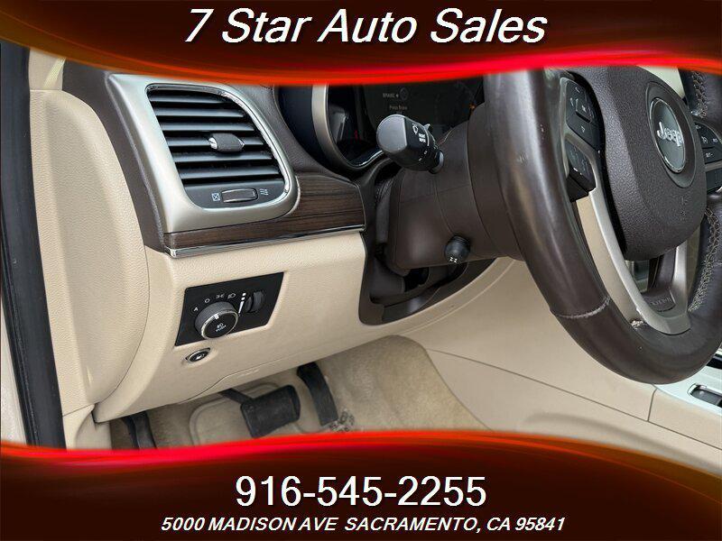 used 2014 Jeep Grand Cherokee car, priced at $12,499