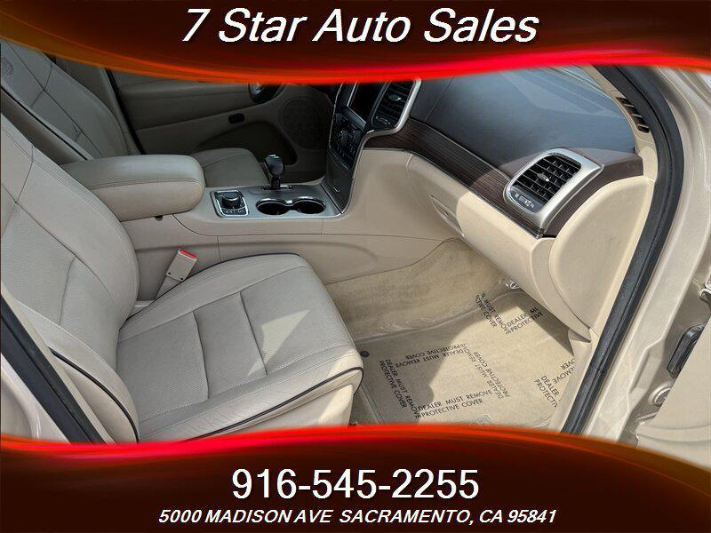 used 2014 Jeep Grand Cherokee car, priced at $12,499