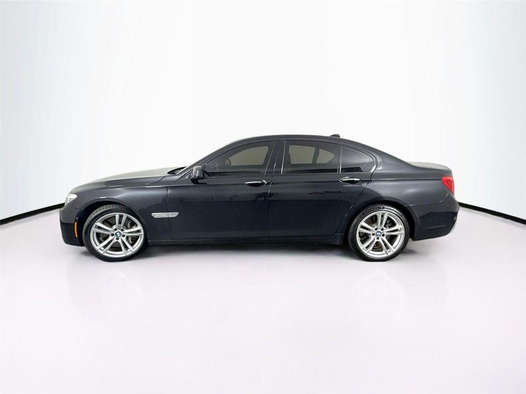 used 2011 BMW 750 car, priced at $15,000
