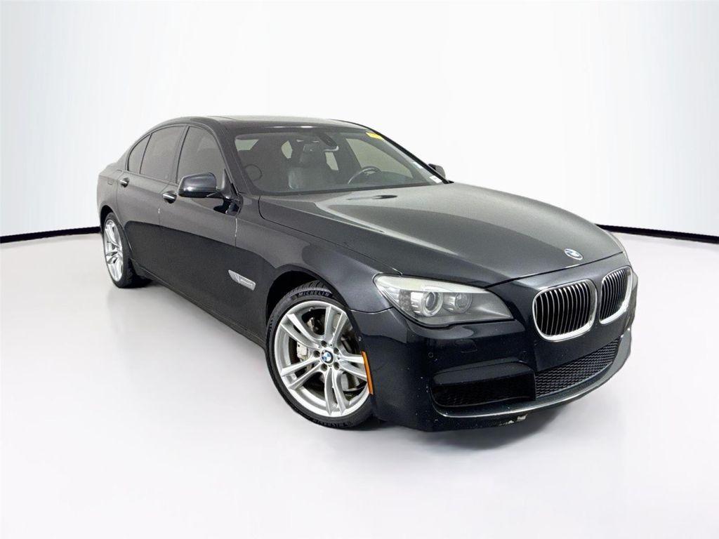 used 2011 BMW 750 car, priced at $15,000