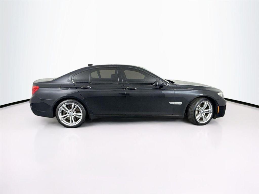 used 2011 BMW 750 car, priced at $15,000