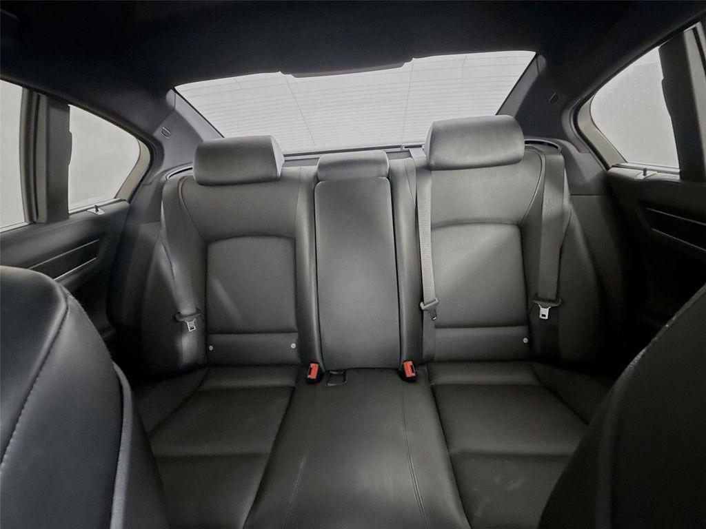 used 2011 BMW 750 car, priced at $15,000