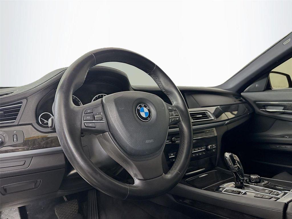 used 2011 BMW 750 car, priced at $15,000