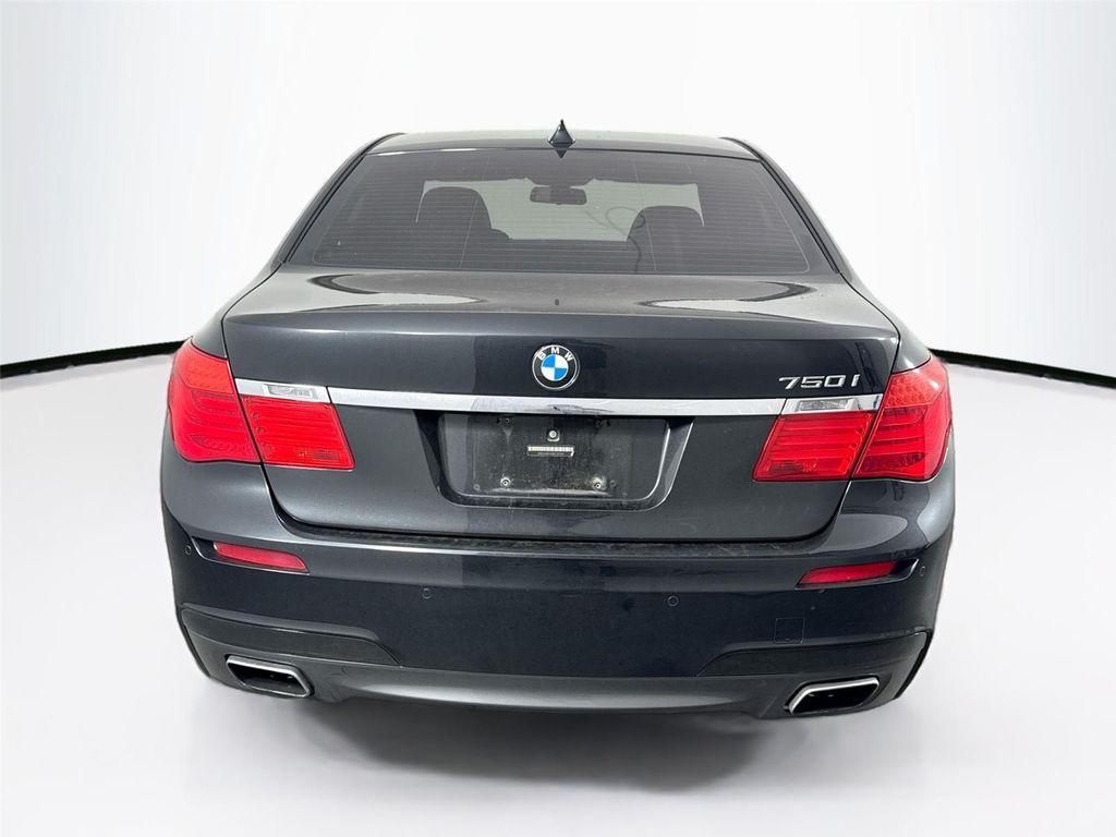 used 2011 BMW 750 car, priced at $15,000