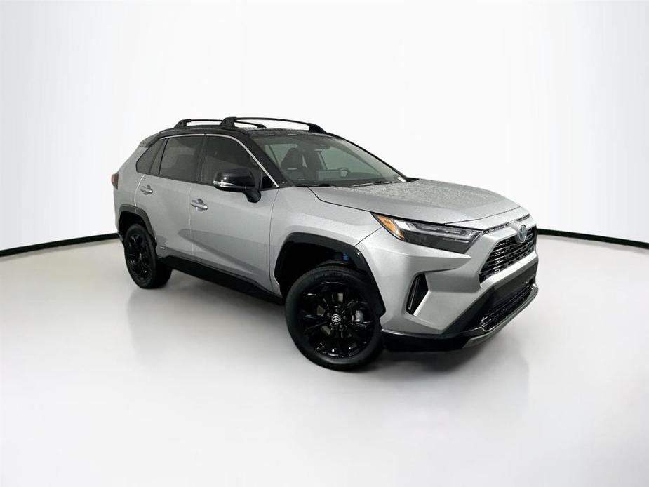 used 2023 Toyota RAV4 Hybrid car, priced at $40,000