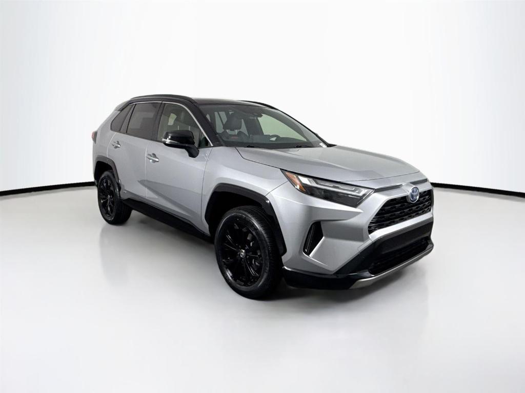 used 2022 Toyota RAV4 Hybrid car, priced at $35,000