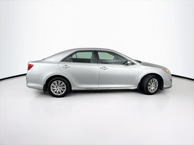 used 2014 Toyota Camry car, priced at $18,000