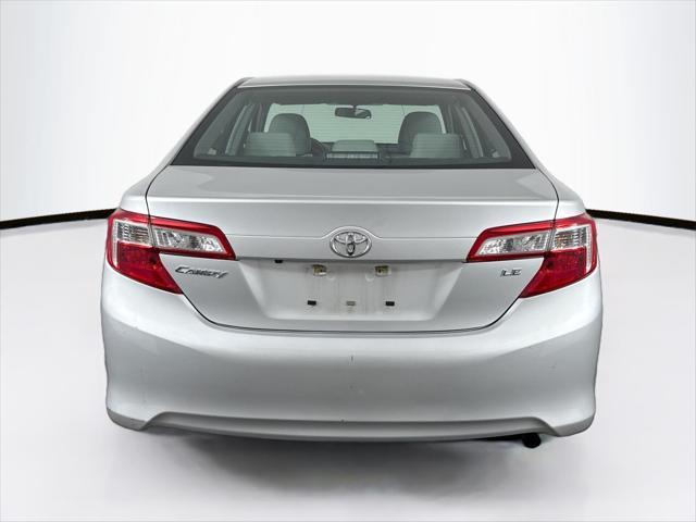 used 2014 Toyota Camry car, priced at $18,000