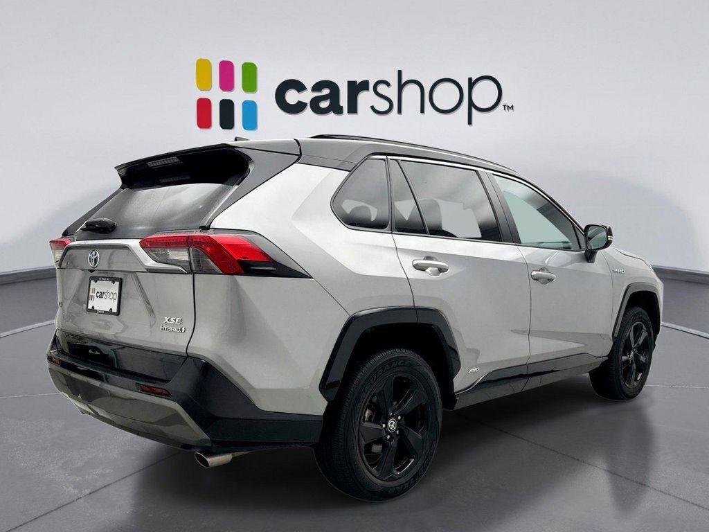used 2021 Toyota RAV4 Hybrid car, priced at $31,596