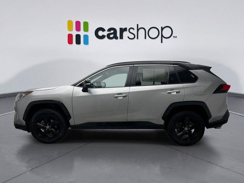 used 2021 Toyota RAV4 Hybrid car, priced at $31,596