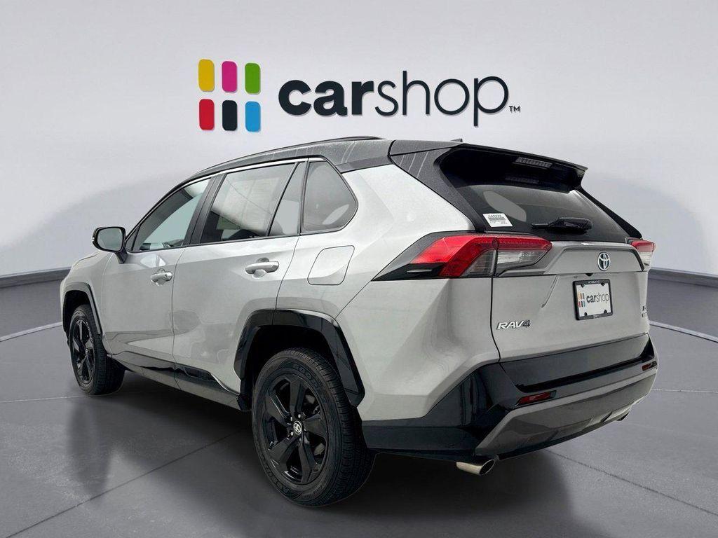 used 2021 Toyota RAV4 Hybrid car, priced at $31,596