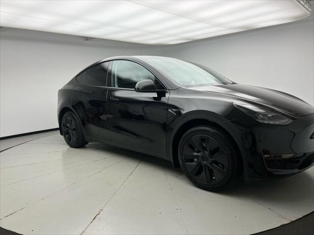 used 2024 Tesla Model Y car, priced at $35,600