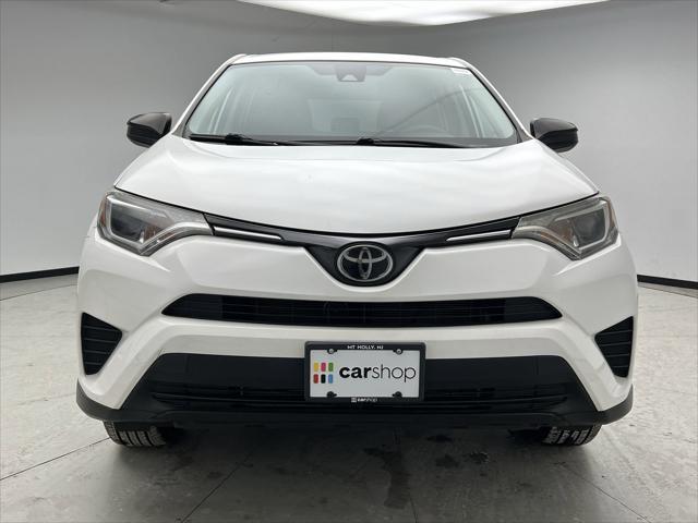 used 2018 Toyota RAV4 car, priced at $19,048