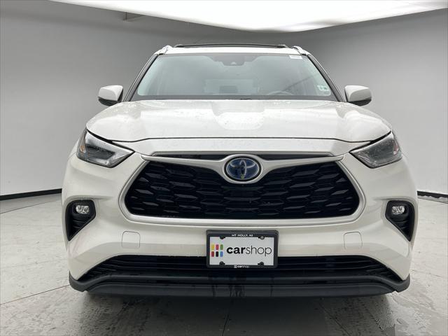 used 2021 Toyota Highlander Hybrid car, priced at $35,249