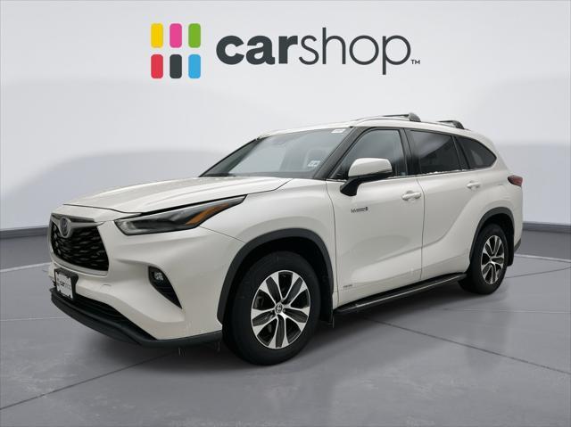 used 2021 Toyota Highlander Hybrid car, priced at $35,249