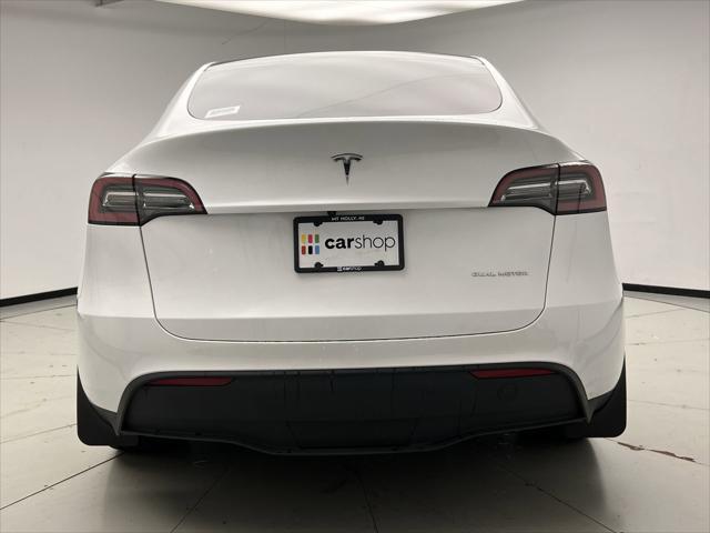 used 2023 Tesla Model Y car, priced at $30,600