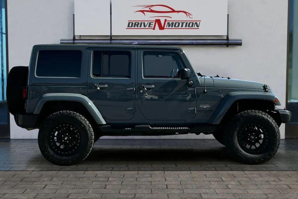 used 2015 Jeep Wrangler Unlimited car, priced at $19,984