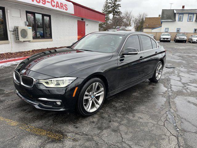 used 2018 BMW 330 car, priced at $19,995