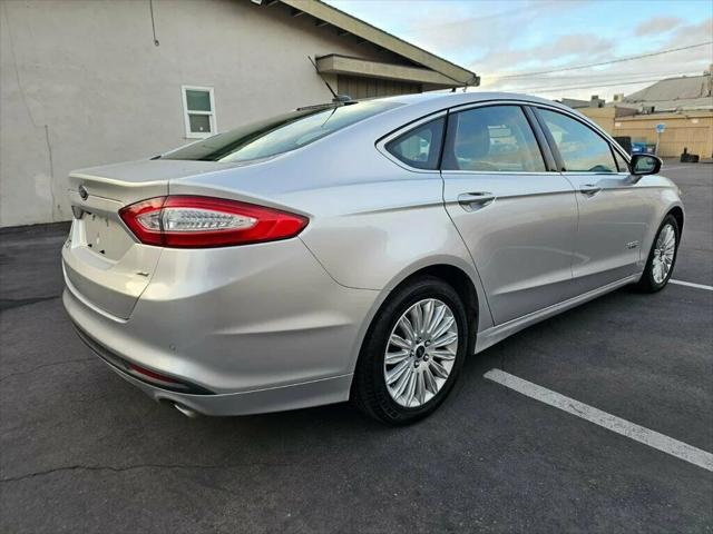 used 2015 Ford Fusion Energi car, priced at $10,298