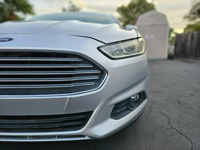 used 2015 Ford Fusion Energi car, priced at $10,298