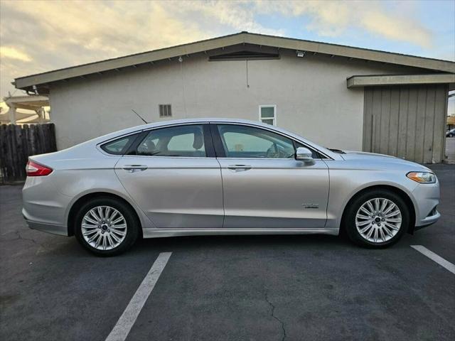 used 2015 Ford Fusion Energi car, priced at $10,298