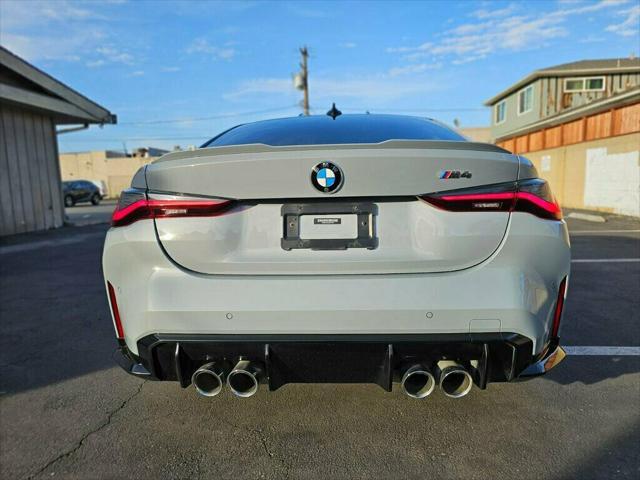 used 2021 BMW M4 car, priced at $57,498