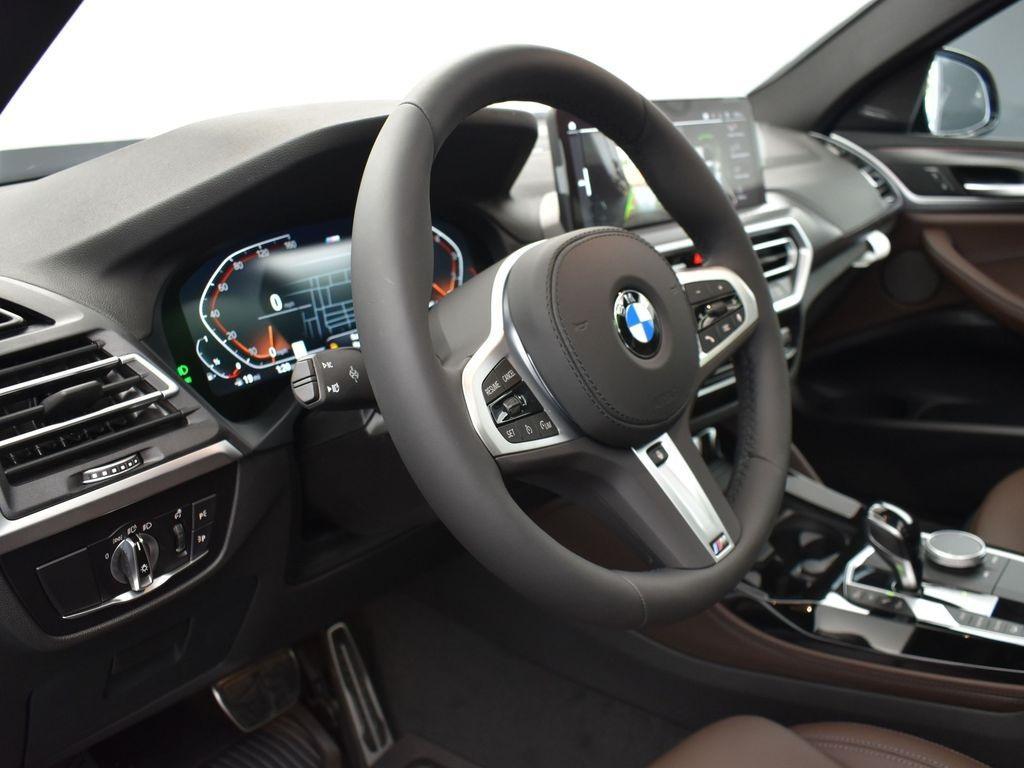 new 2025 BMW X4 car, priced at $87,315