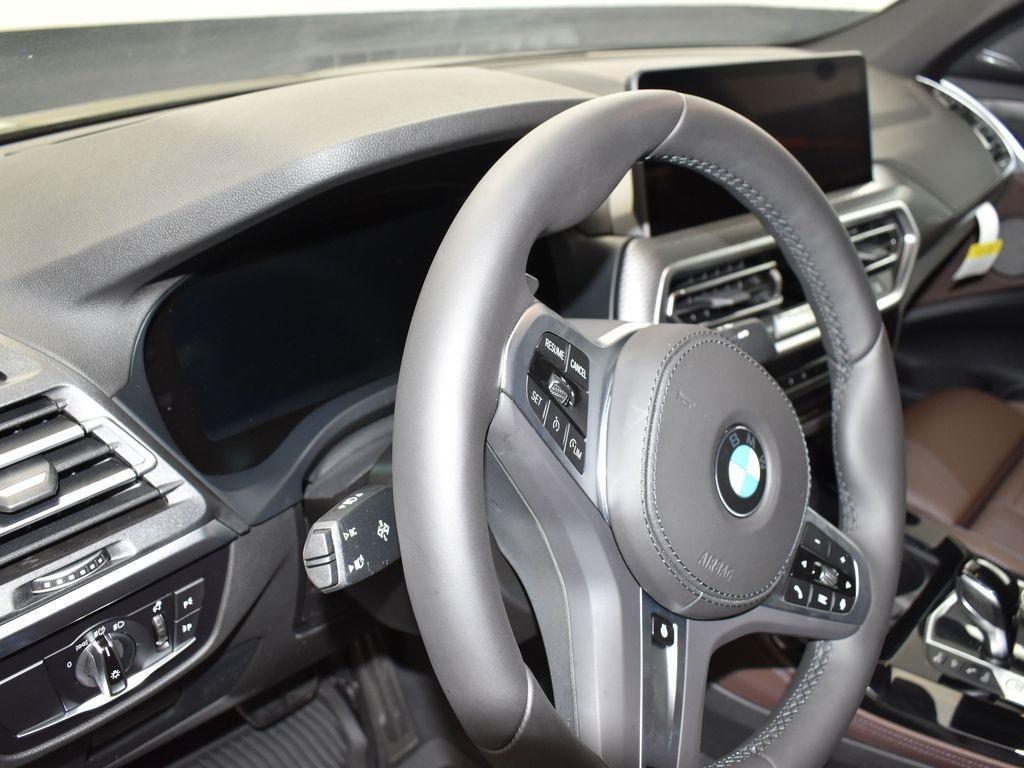 new 2025 BMW X4 car, priced at $87,315