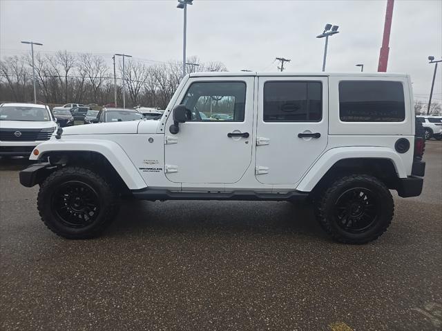 used 2013 Jeep Wrangler Unlimited car, priced at $13,900