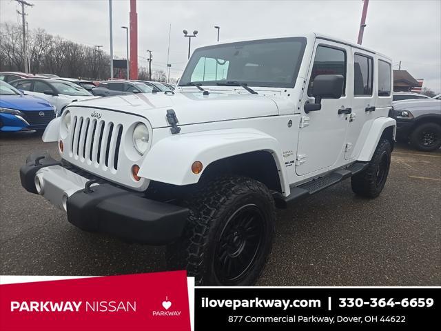 used 2013 Jeep Wrangler Unlimited car, priced at $13,900