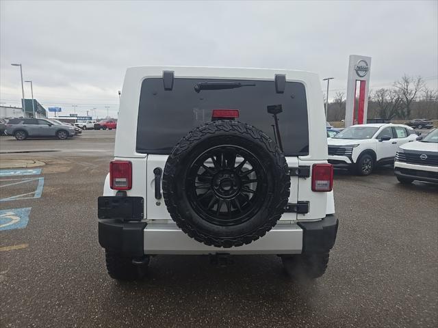 used 2013 Jeep Wrangler Unlimited car, priced at $13,900