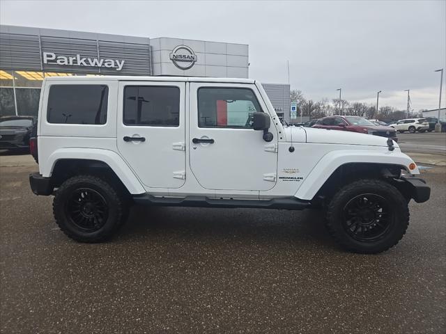 used 2013 Jeep Wrangler Unlimited car, priced at $13,900