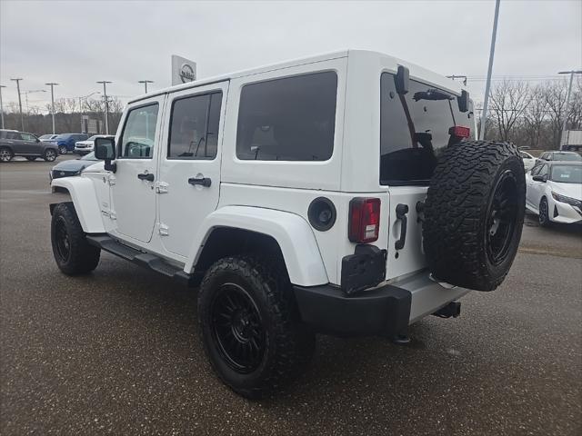 used 2013 Jeep Wrangler Unlimited car, priced at $13,900