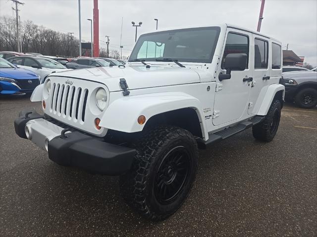 used 2013 Jeep Wrangler Unlimited car, priced at $13,900