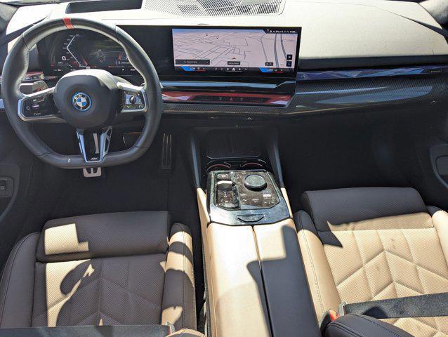 used 2024 BMW i5 car, priced at $57,364