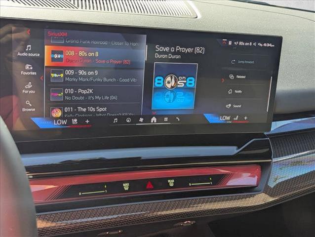 used 2024 BMW i5 car, priced at $57,364