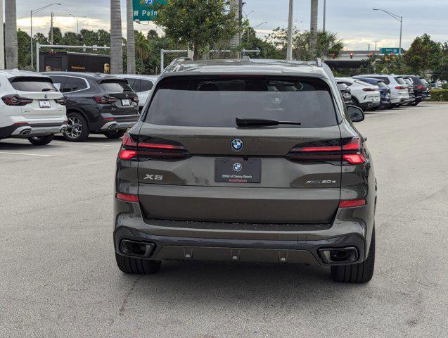 new 2025 BMW X5 PHEV car, priced at $84,060