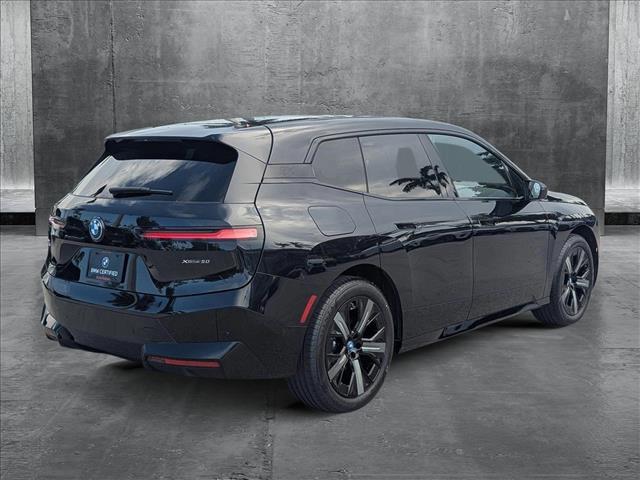 used 2024 BMW iX car, priced at $62,222