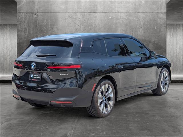 new 2025 BMW iX car, priced at $97,425