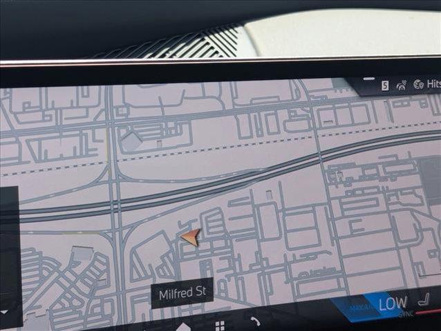 new 2025 BMW 740 car, priced at $118,915