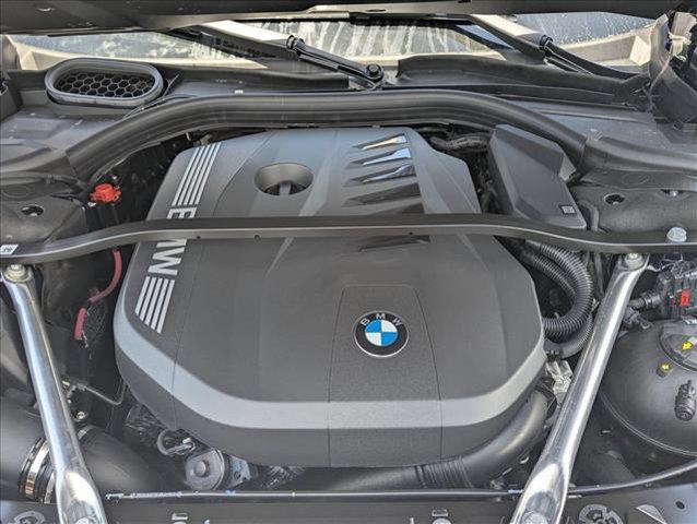 new 2025 BMW 740 car, priced at $118,915
