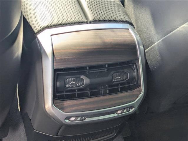 used 2025 BMW 740 car, priced at $83,395