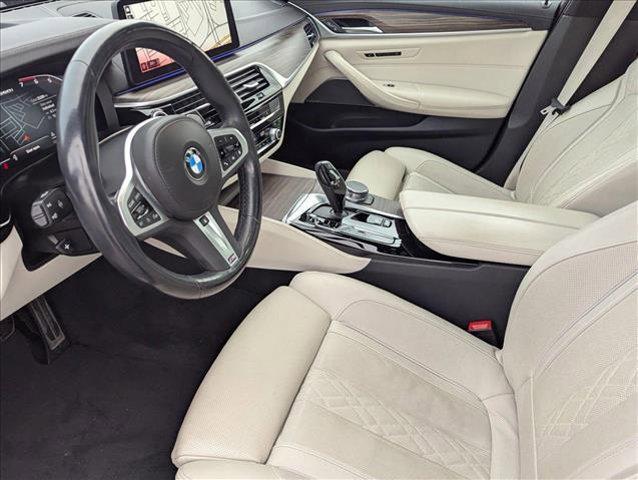 used 2023 BMW M550 car, priced at $57,998